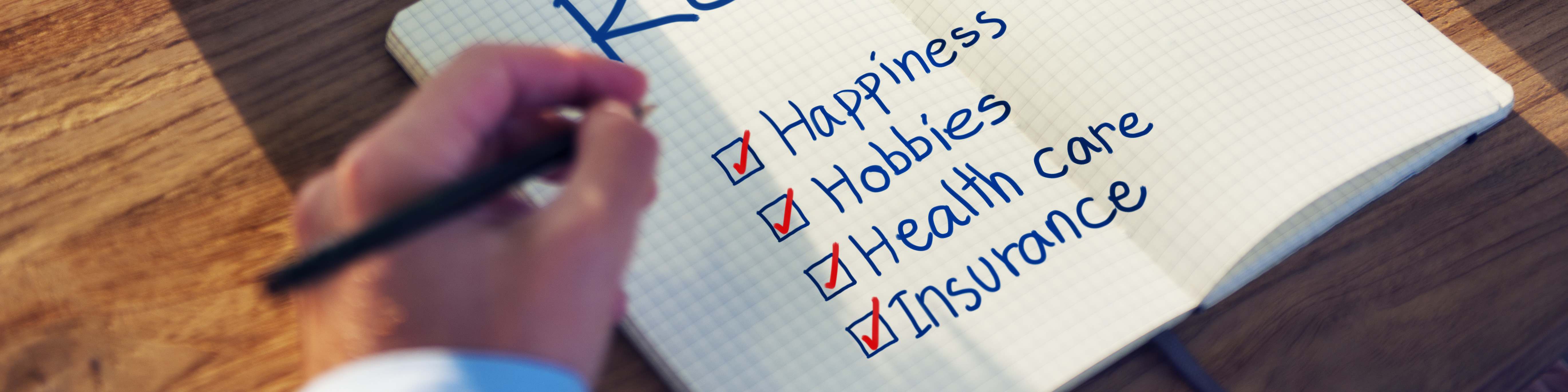 checklist on paper with happiness, hobbies, health care, and insurance checked