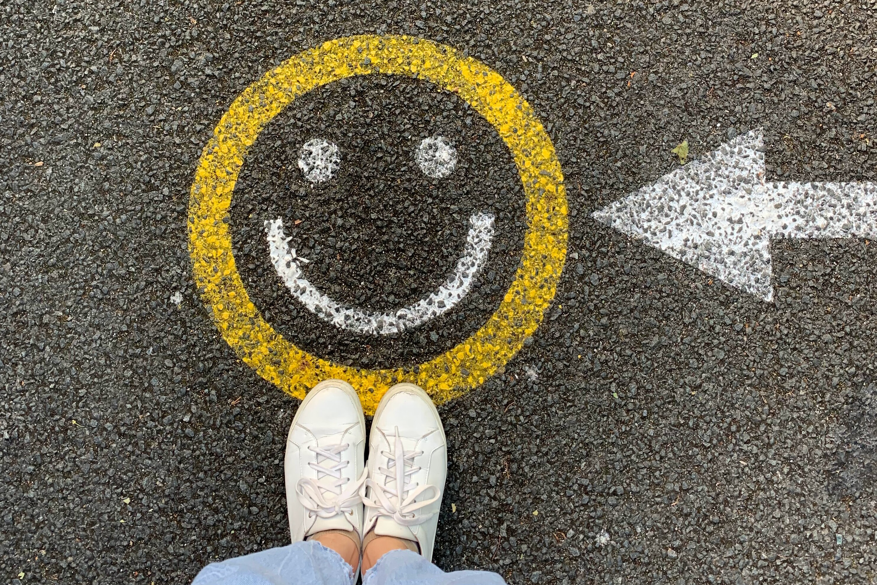 smiley face painted on the road