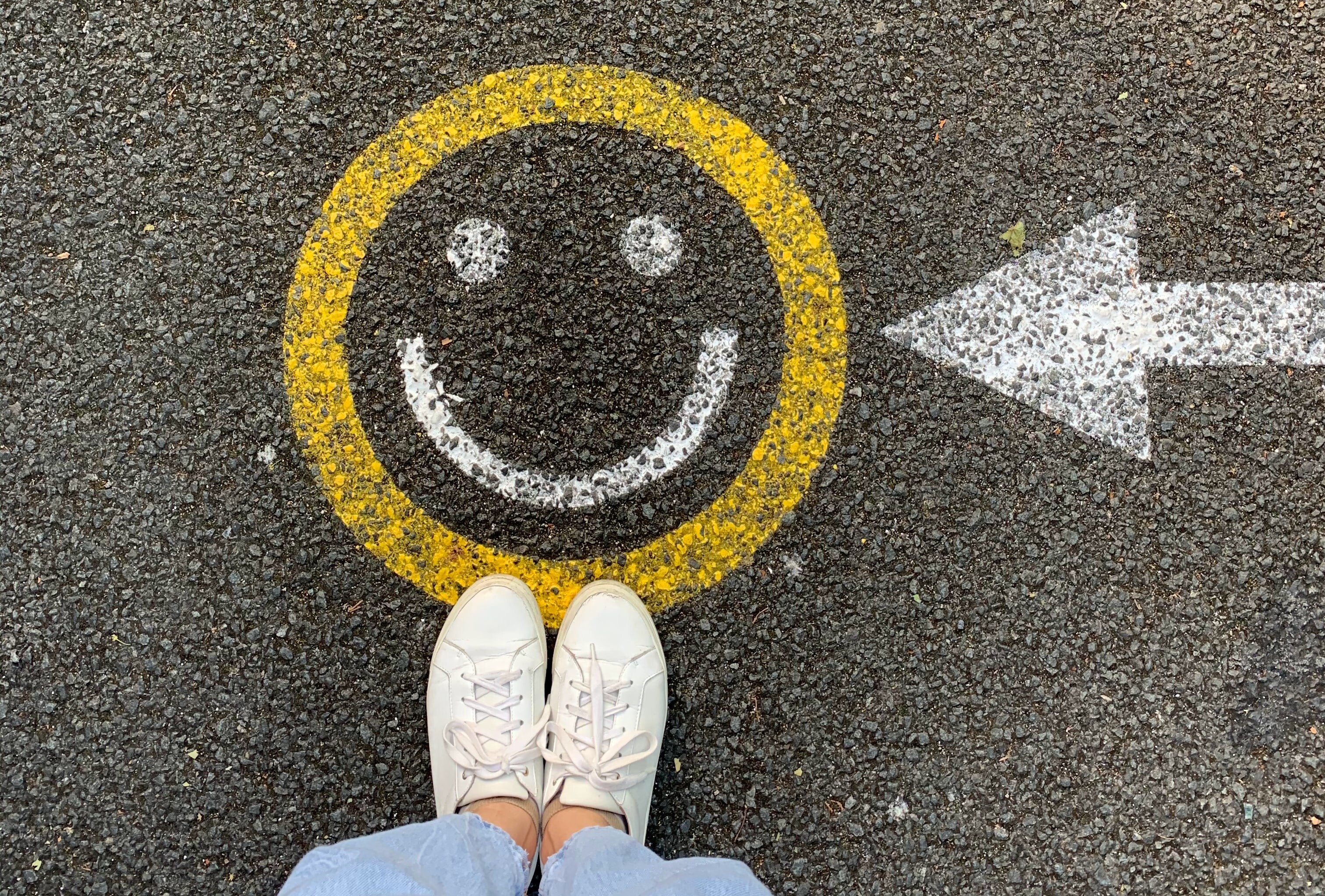 smiley face painted on the road