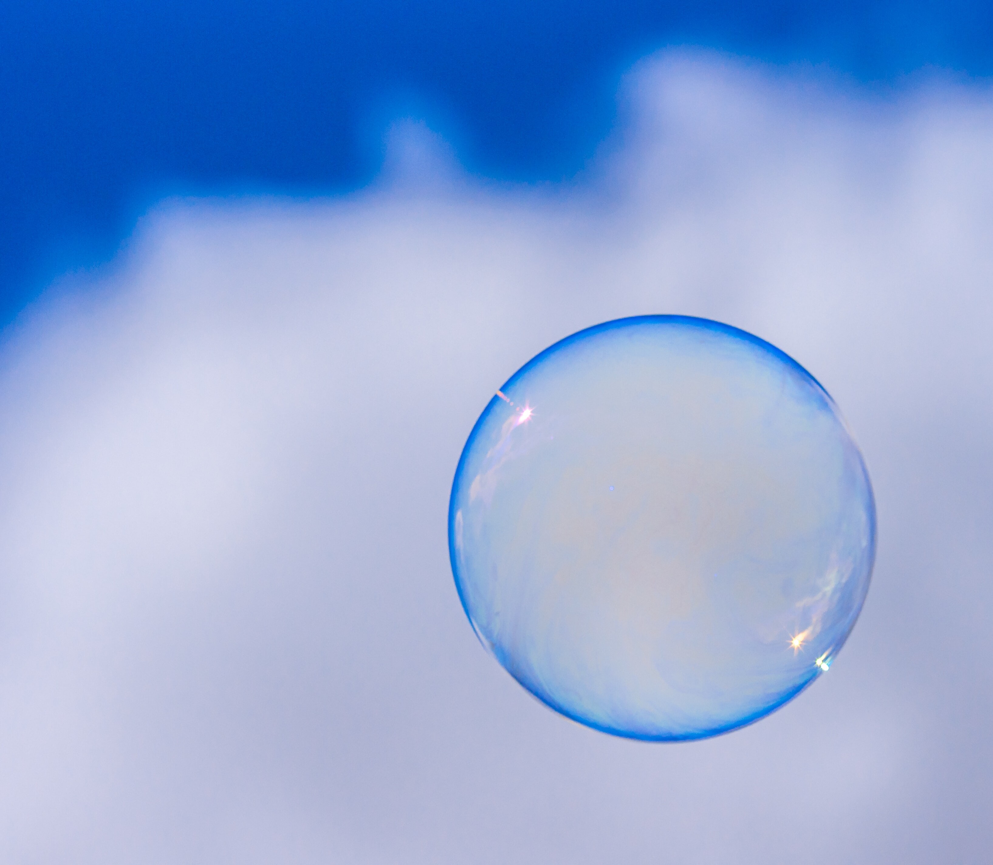 bubble in front of a cloud