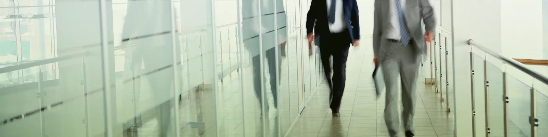 Vermont Financial Planning Team walking down a hallway talking together